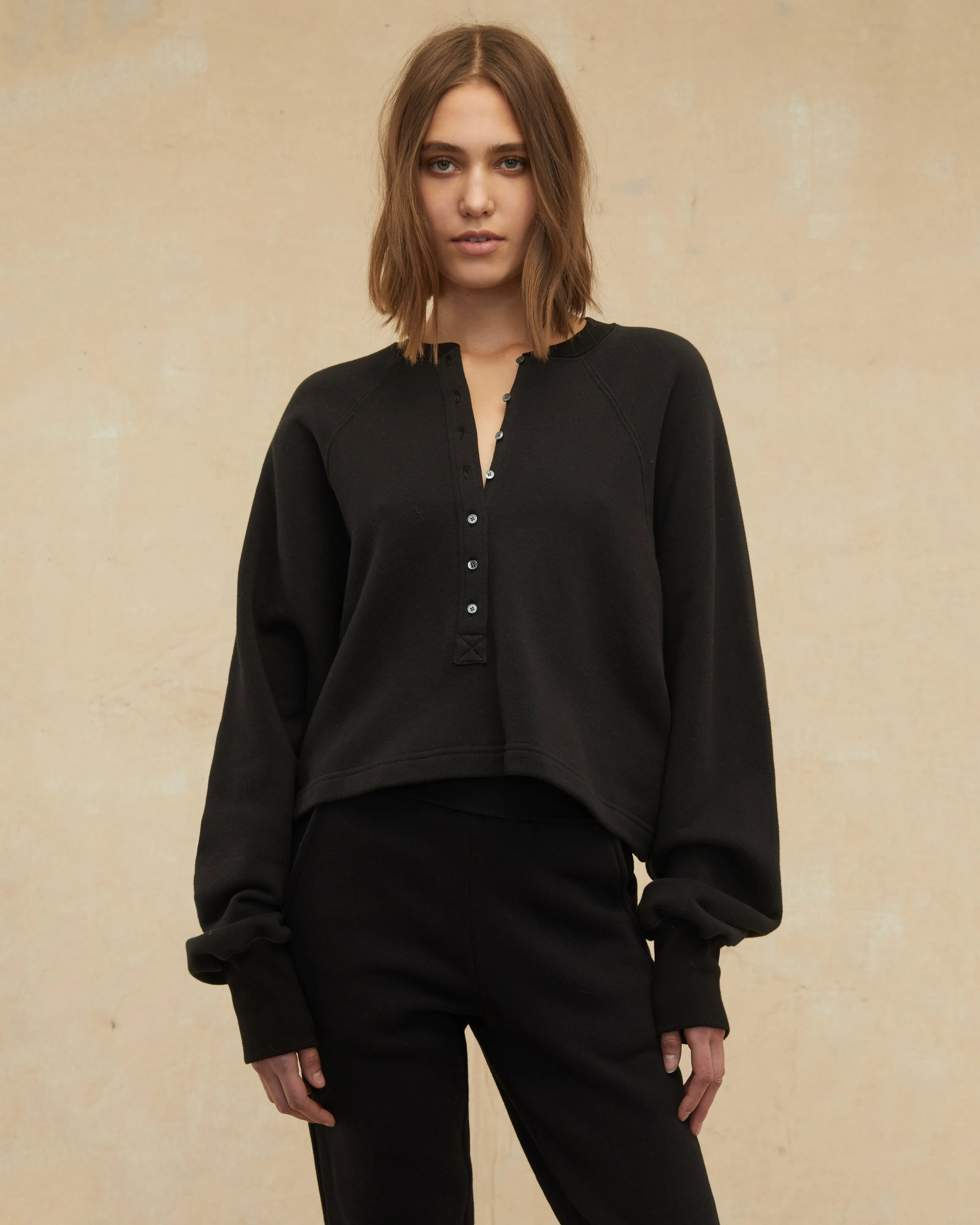 So Uptight French Terry Plunge Henley Sweatshirt in Black